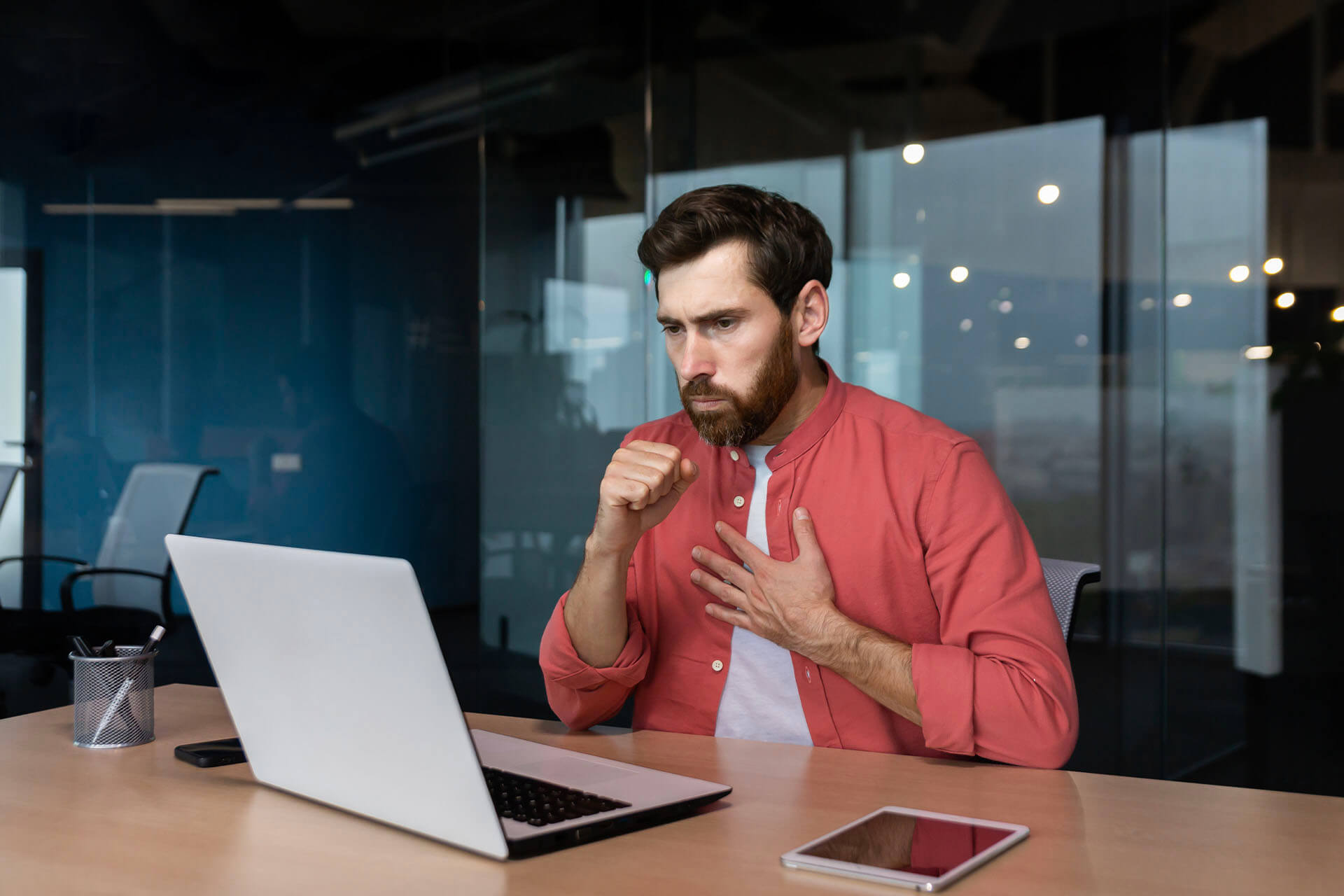 Everest_0050_sick-man-at-workplace-mature-worker-in-red-shirt-2023-02-21-02-06-36-utc